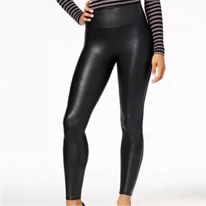 Spanx Women’s Black Faux Leather Leggings in a size Small.